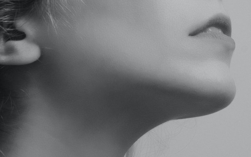 a black and white photo of a woman's face